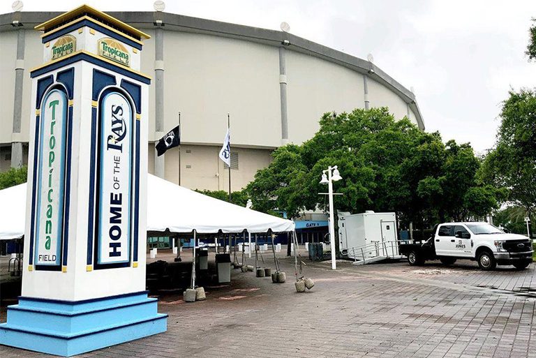 portable restroom trailer outside of Tropicana Field