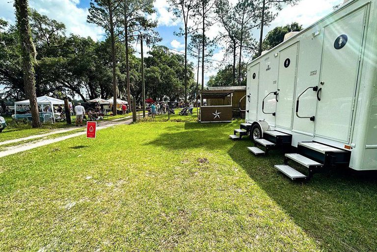 Portable restroom trailers at an outdoor event